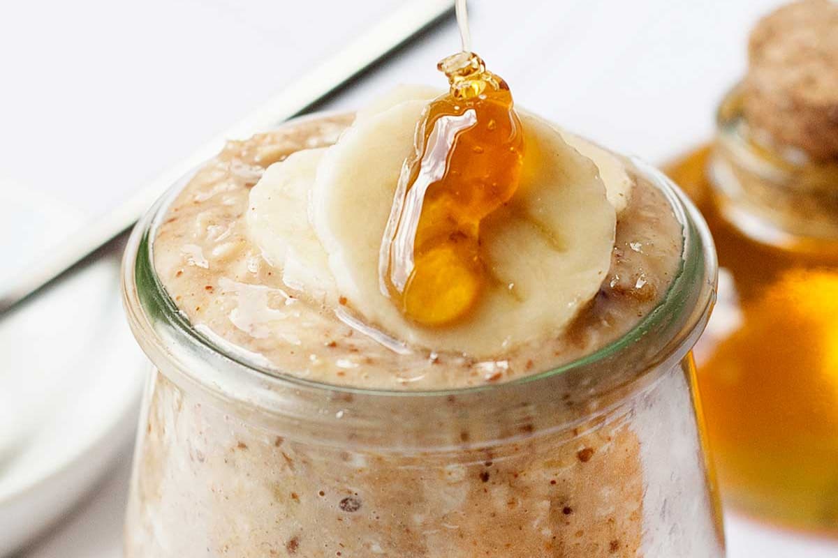 A jar of almond butter overnight oats.