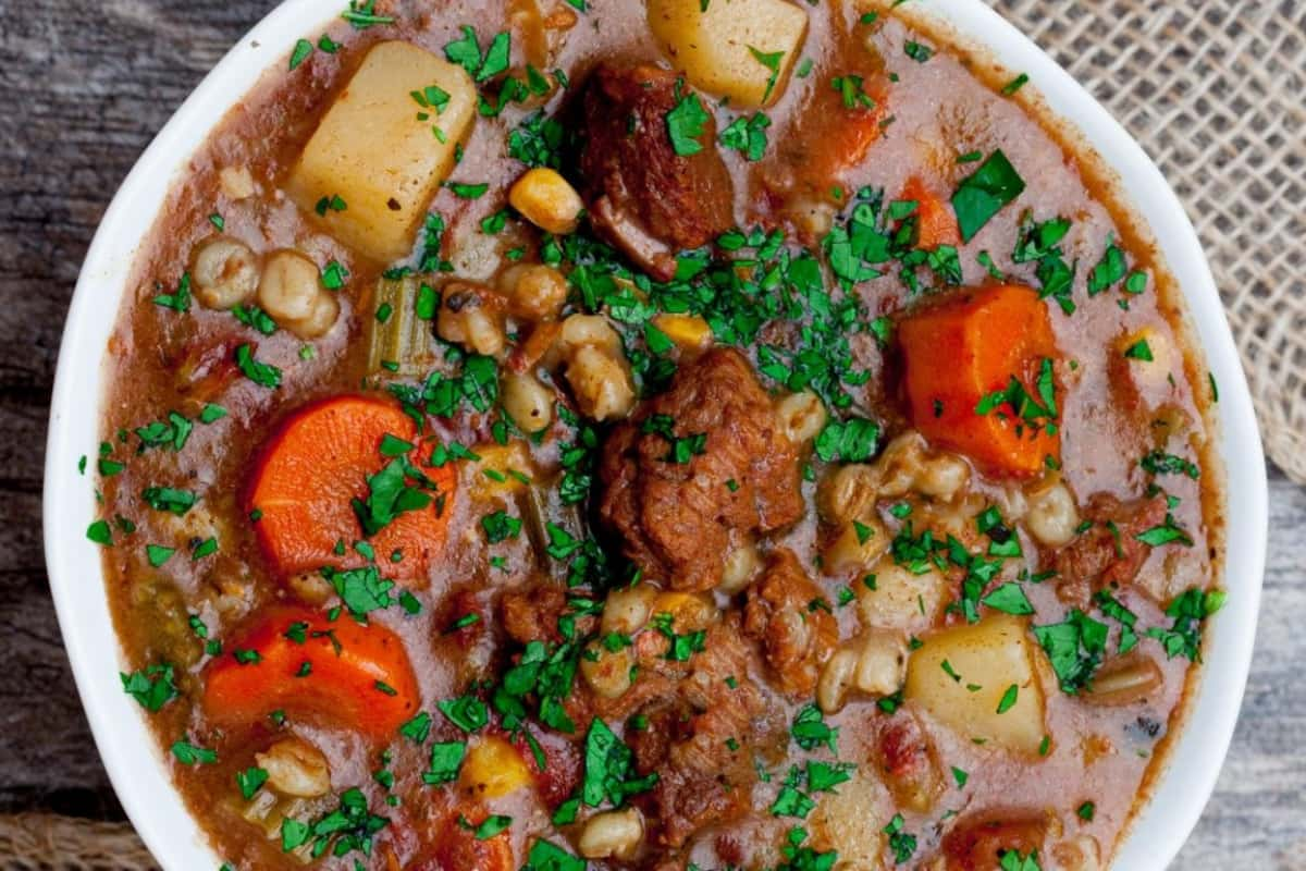 A bowl of beef and barley stew.