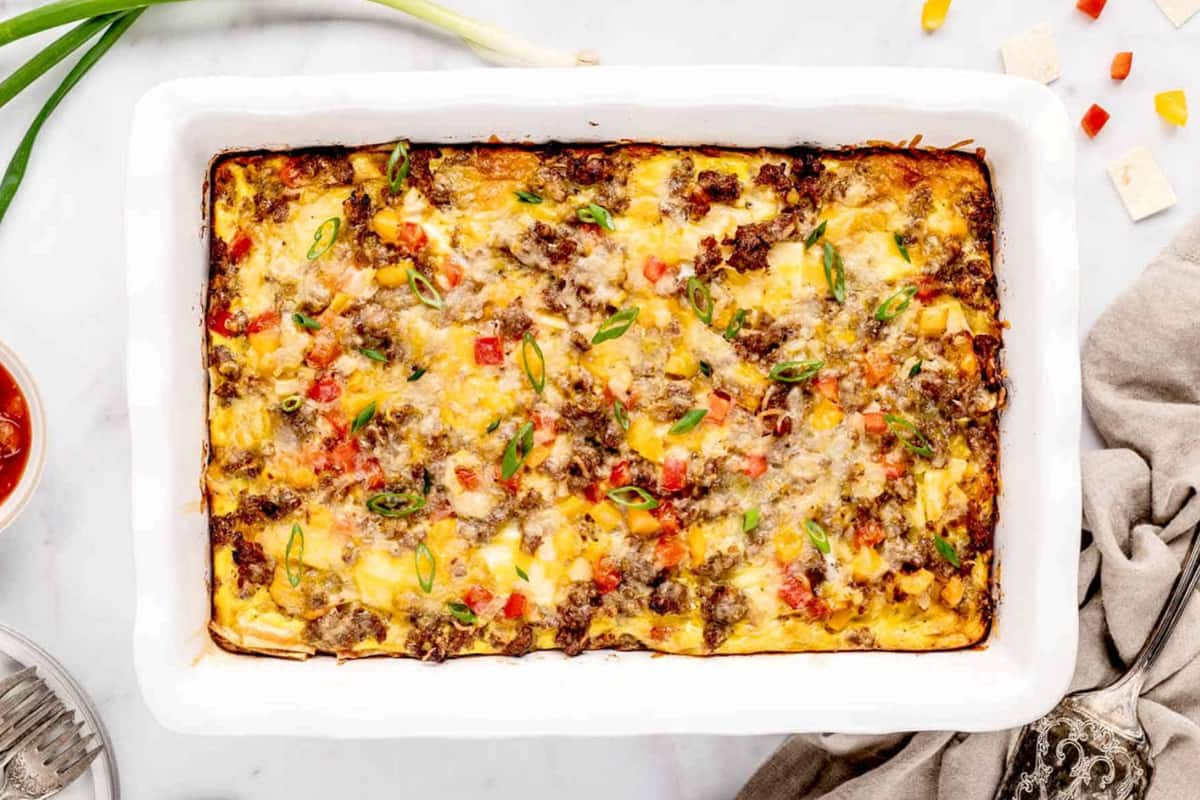 A breakfast burrito casserole in a baking dish.