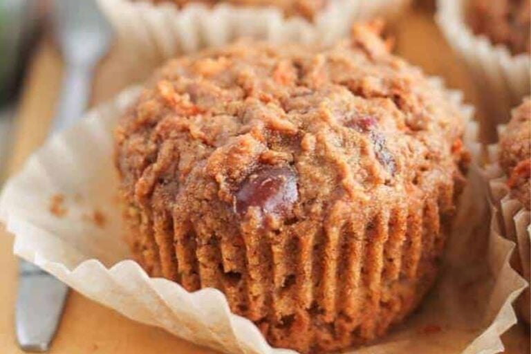 A closeup of a carrot date muffin.