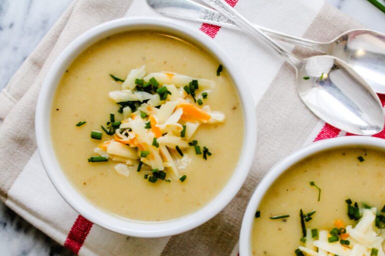 A bowl of cauliflower potato soup.