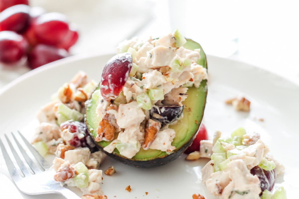 A plate of avocado chicken salad.