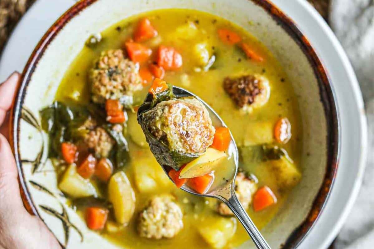 A bowl of chicken meatball soup.