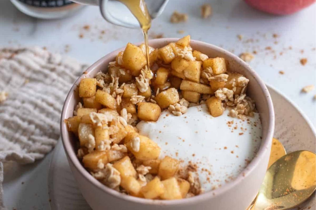 Cinnamon apple breakfast bowl on a counter.