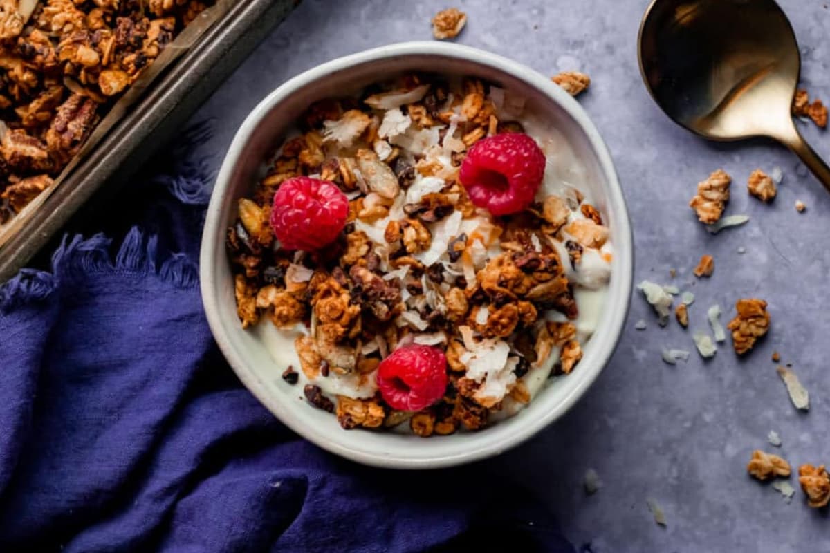 A bowl of coconut cacao granola.