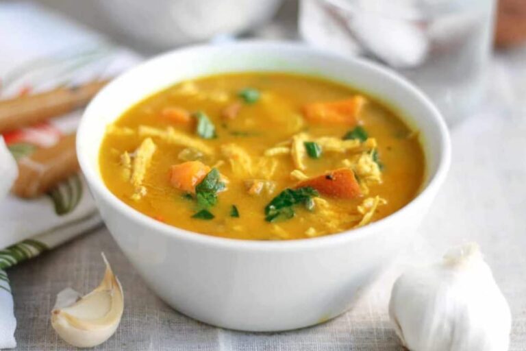 A bowl of creamy coconut curry soup.