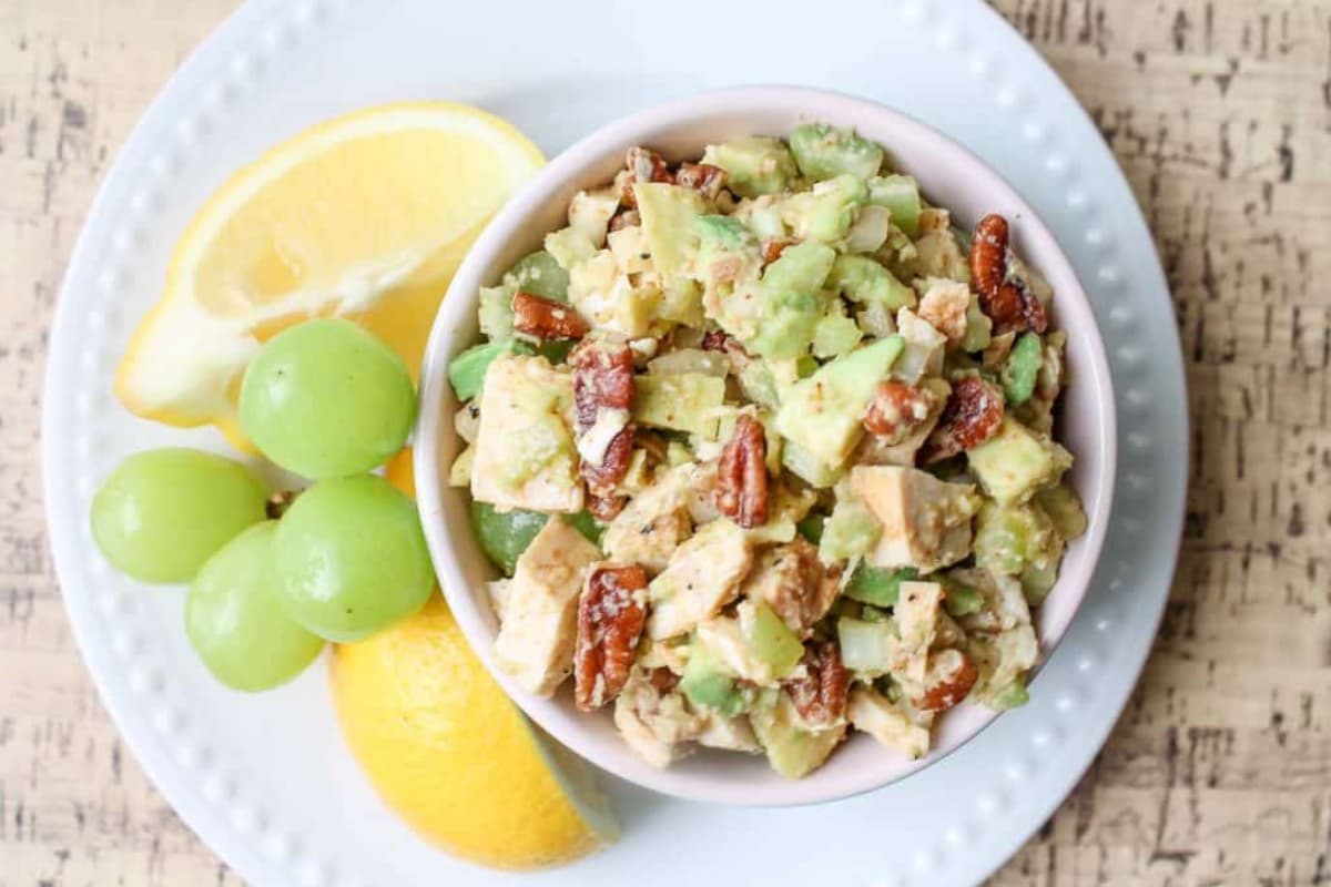 A bowl of crunchy chicken avocado salad.