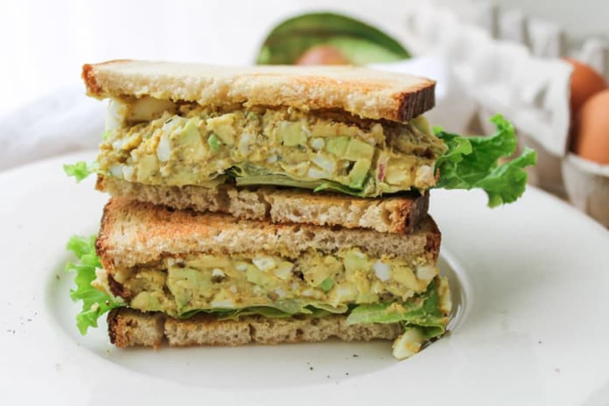 Curried avocado egg salad on a plate.