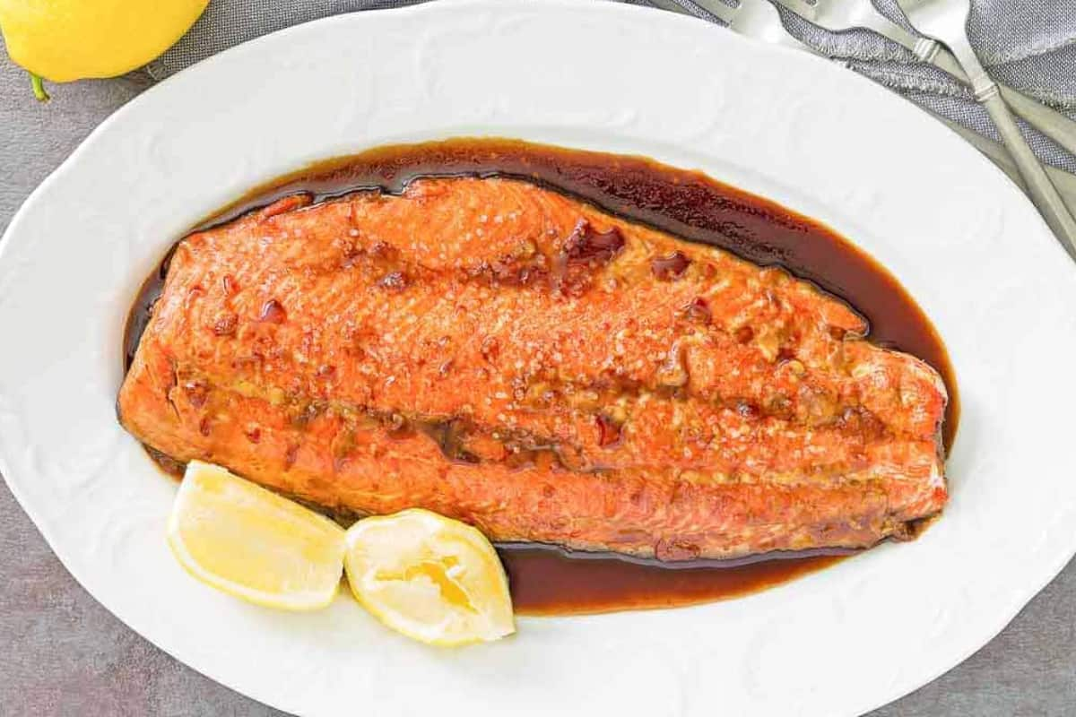 A platter of baked salmon.