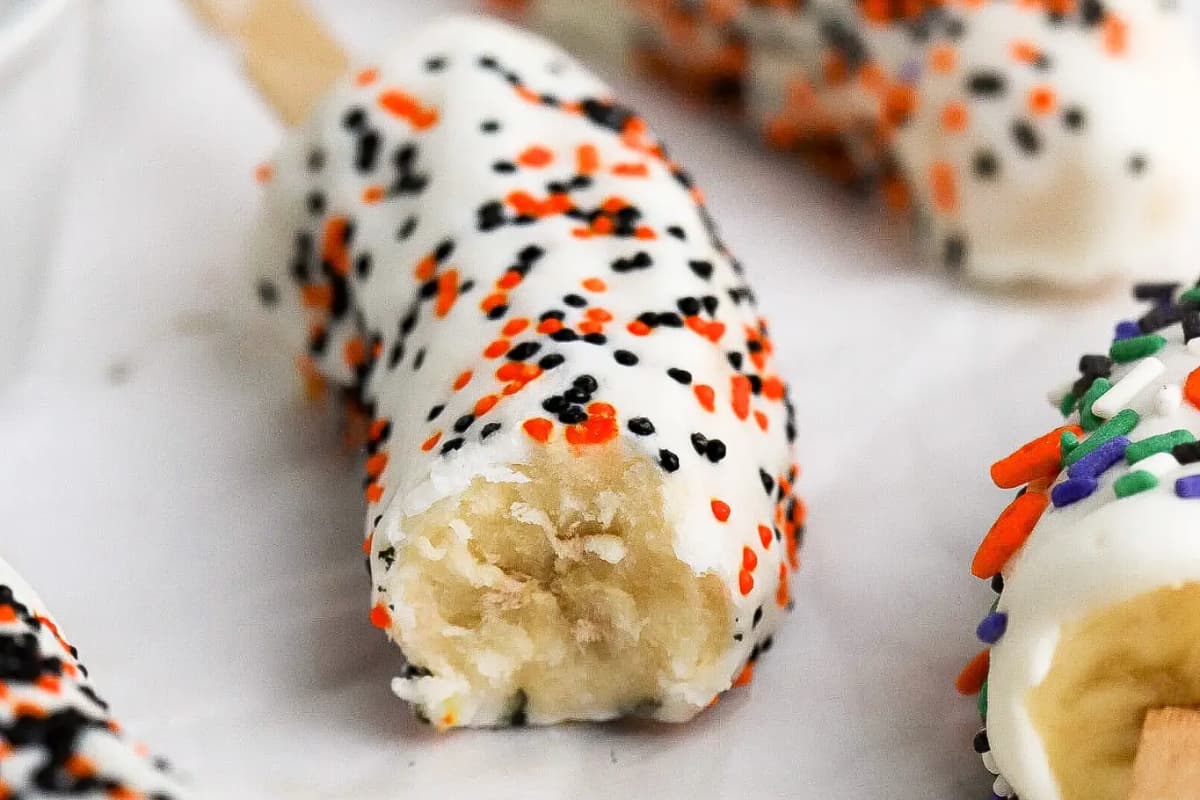 A plate of Halloween banana pops.