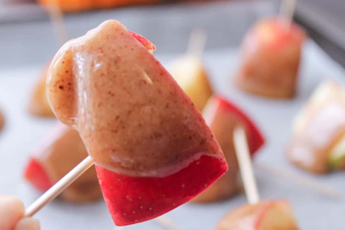 A tray of healthy caramel apples.