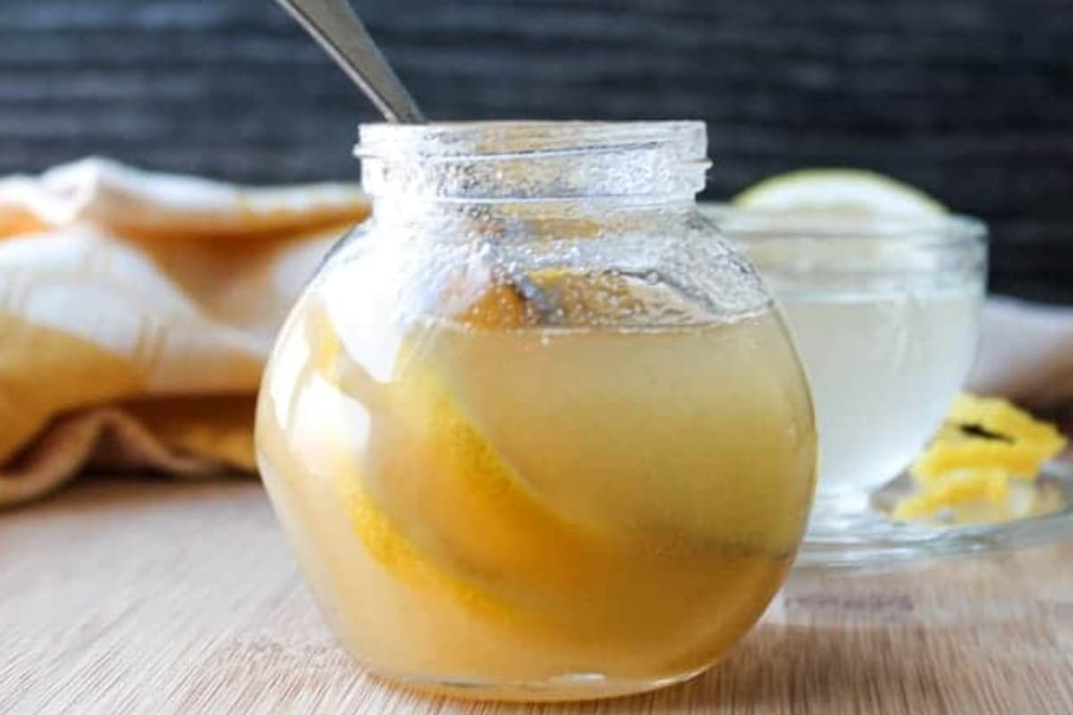 A jar of honey lemon cold remedy.