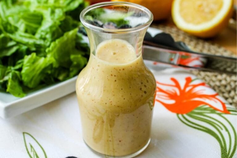 A jar of honey mustard vinaigrette dressing.