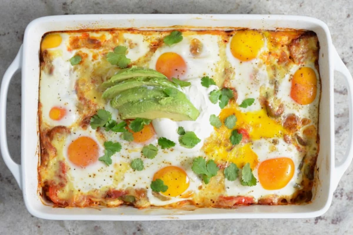 A baking dish of huevos rancheros breakfast casserole.