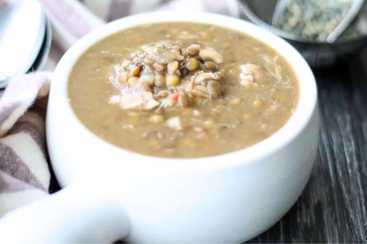 A bowl of instant pot chicken lentil soup.