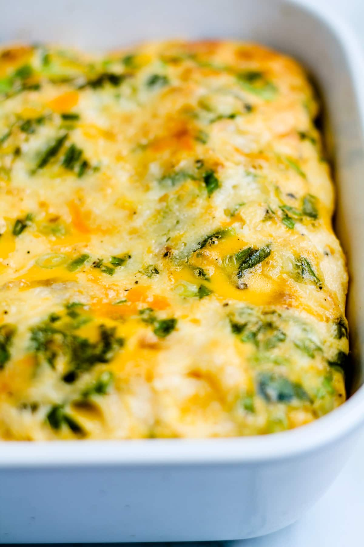 Overhead image of an egg casserole in a baking dish.