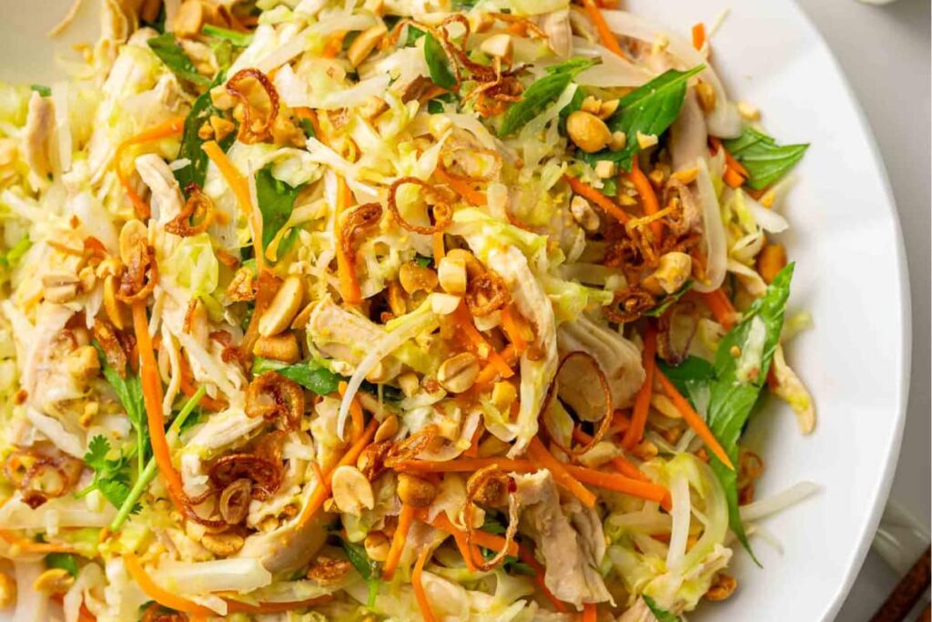 A plate of Vietnamese chicken cabbage salad.