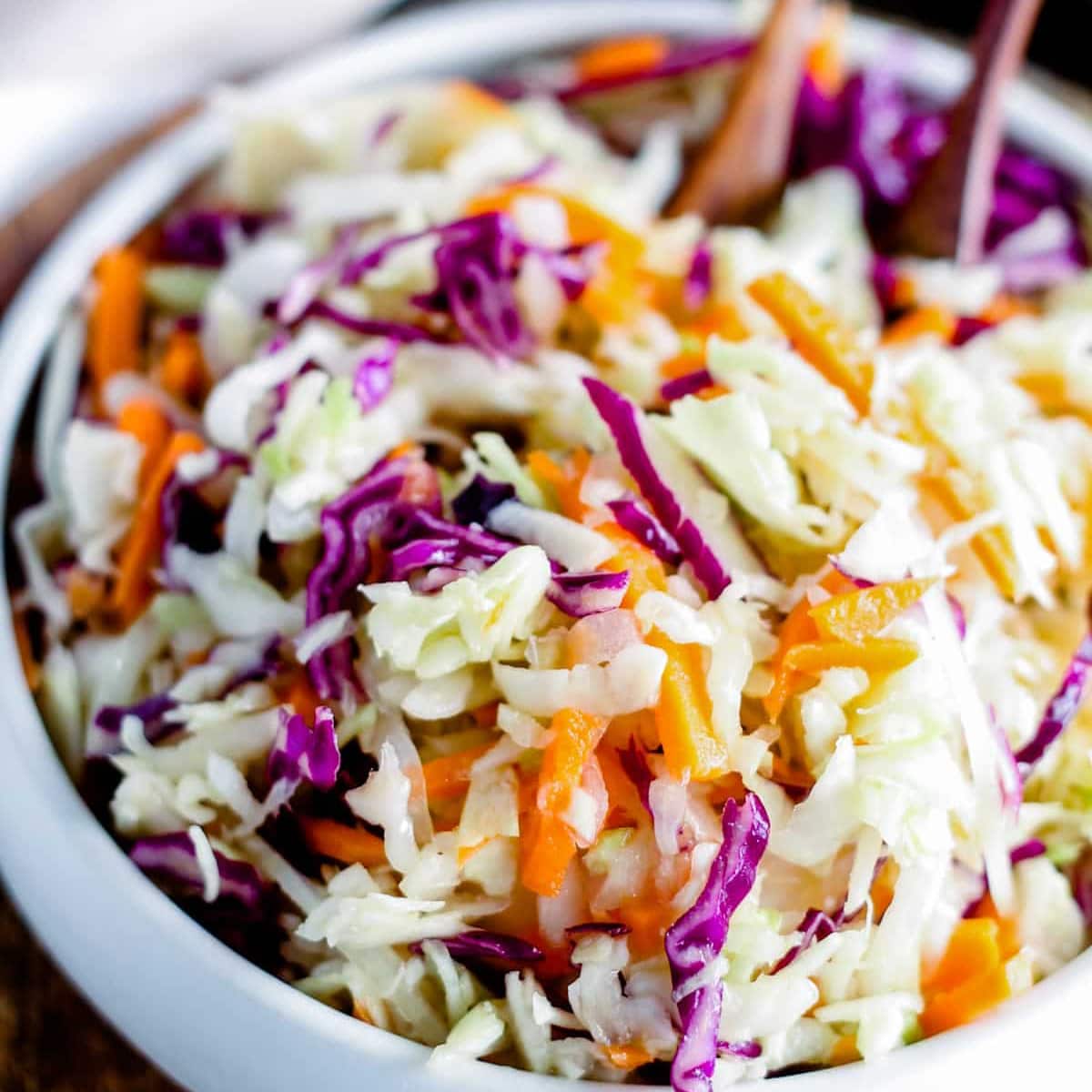 A bowl of vinaigrette coleslaw.
