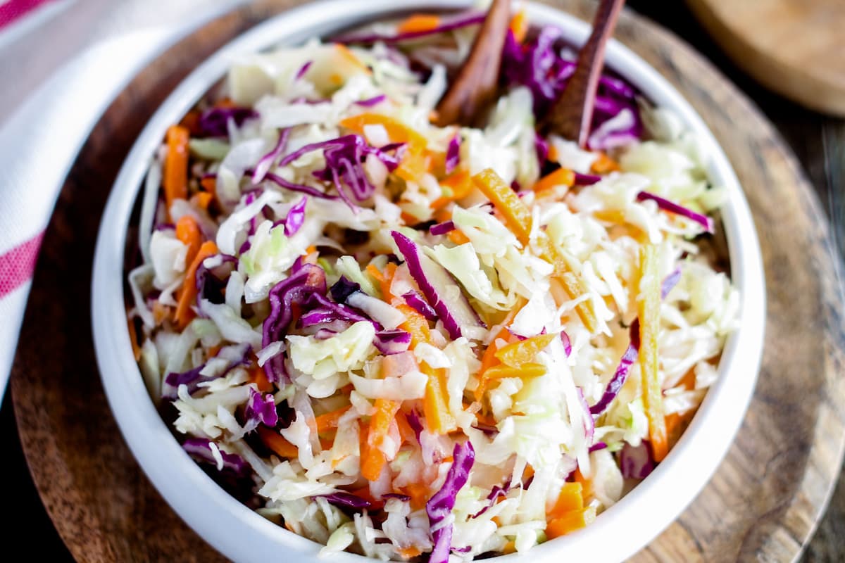 Overhead image of vinaigrette coleslaw in a bowl.