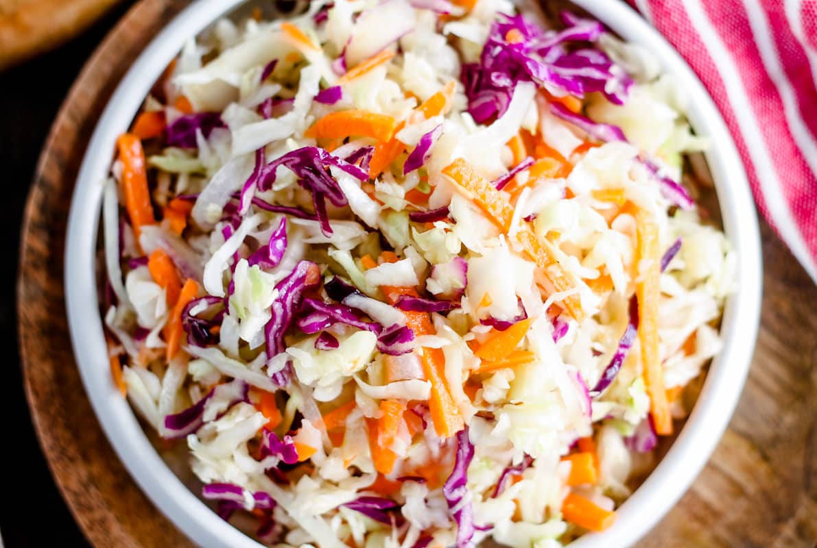 Overhead image of vinaigrette coleslaw in a bowl.