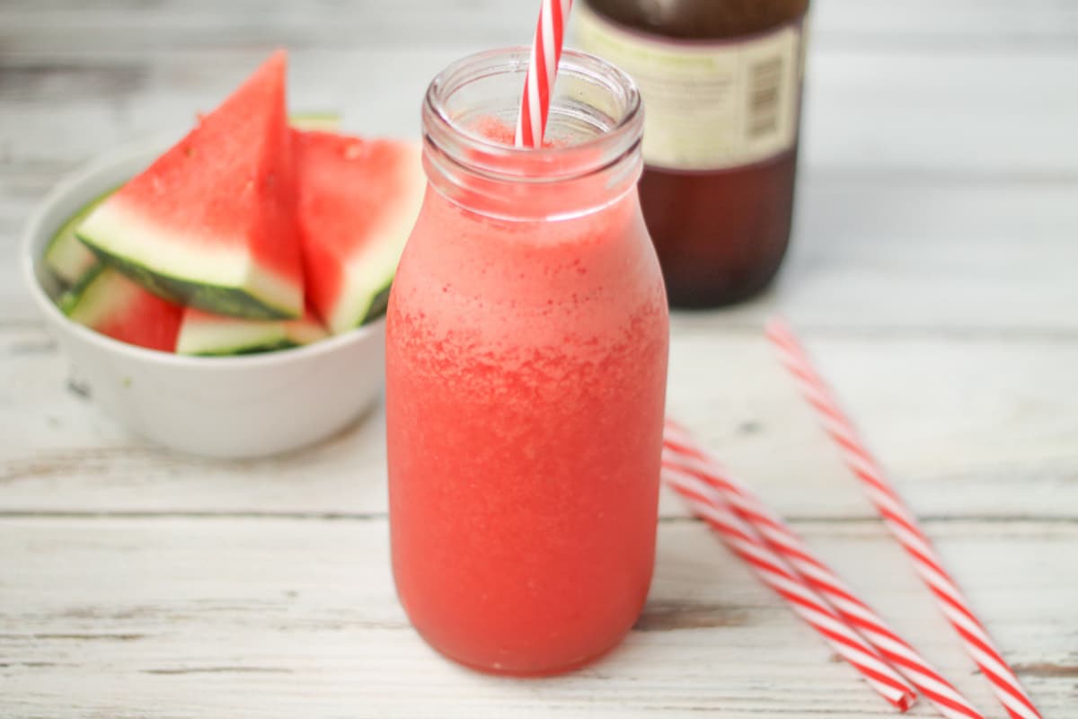 A glass of watermelon kombucha slushie.