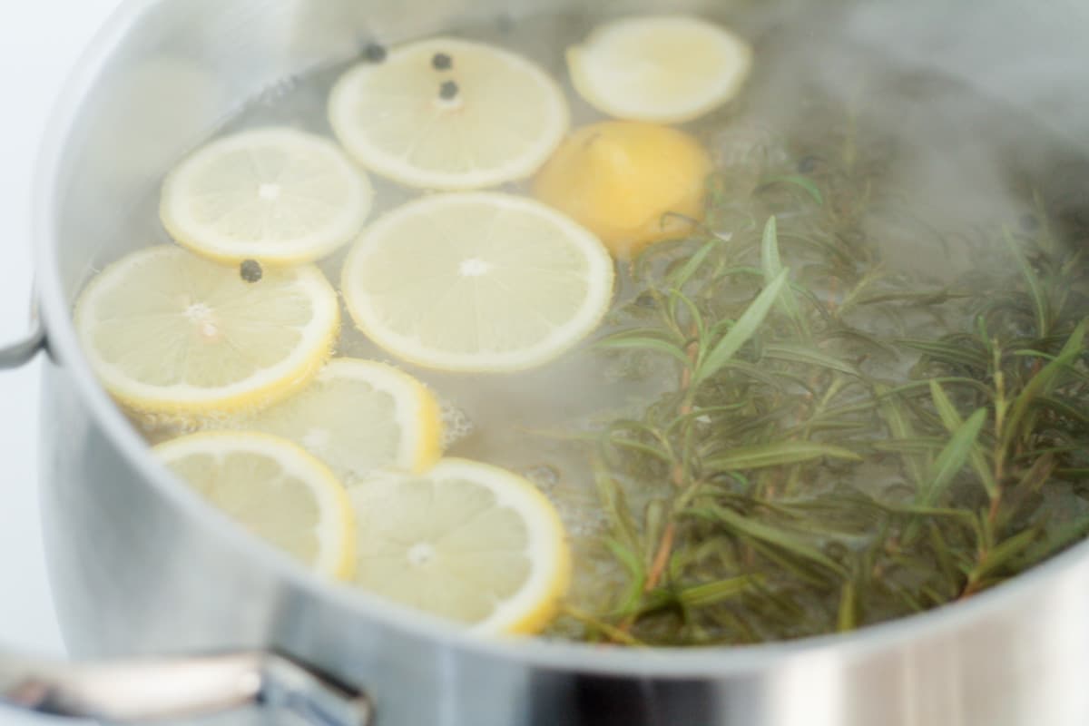 Simmer pot bubbling on a stovetop.