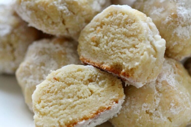 A plate of Italian wedding cookies.