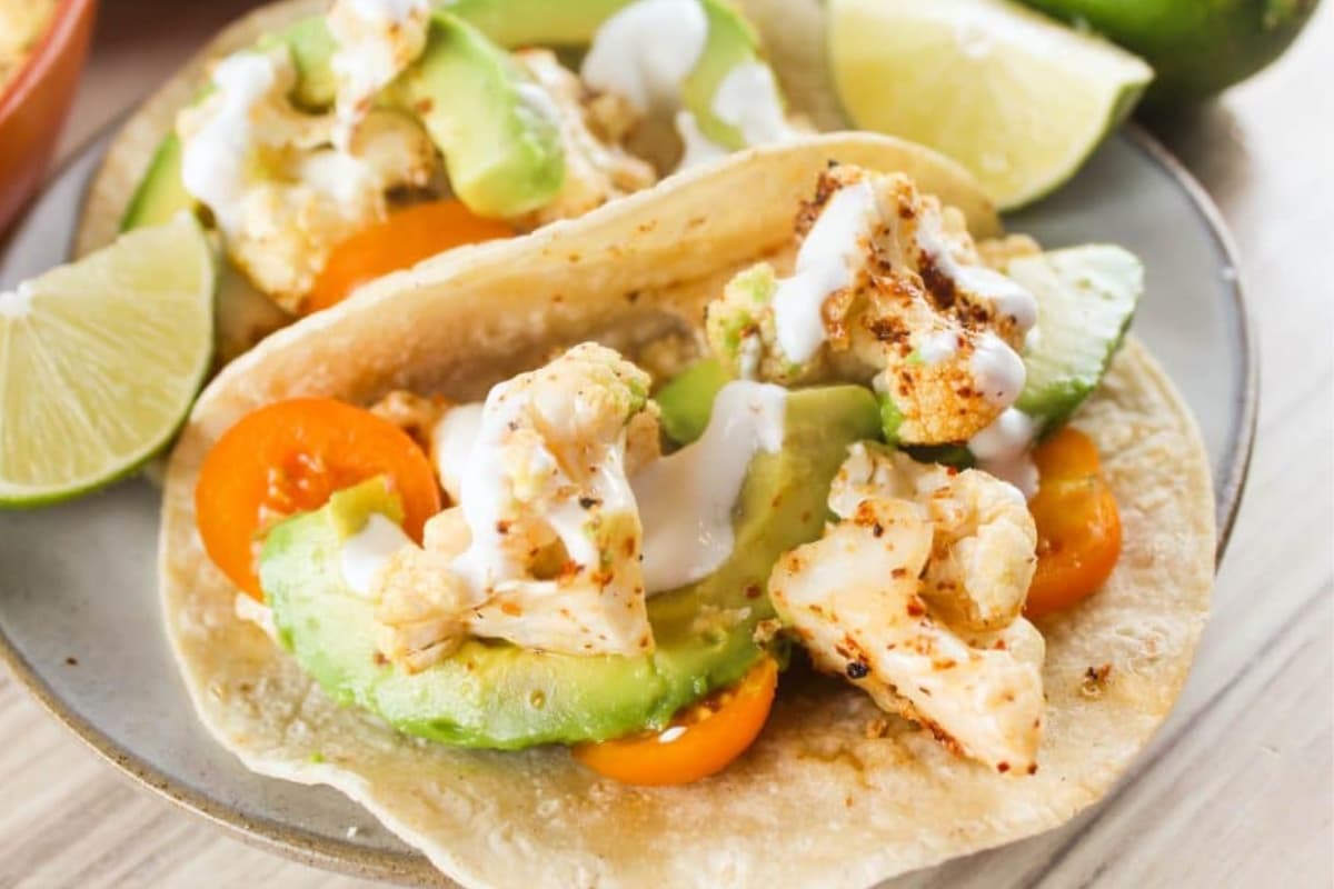 Air fryer cauliflower tacos on a plate.