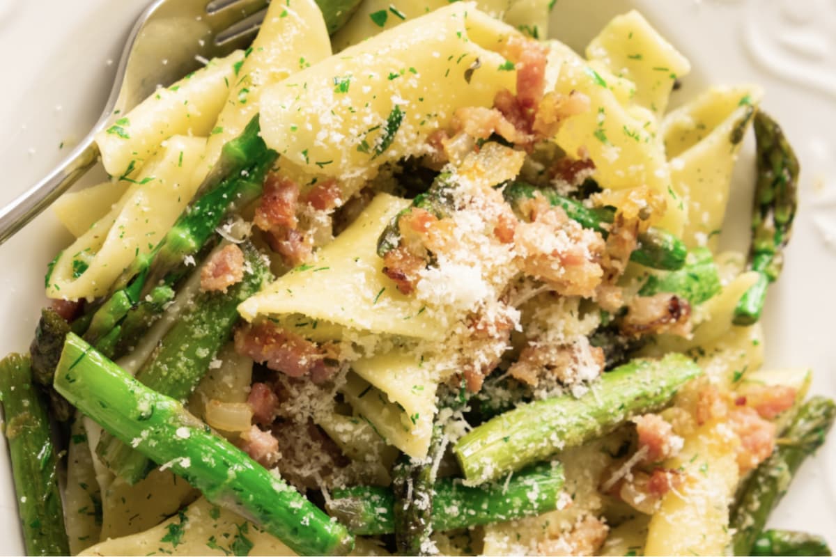 A plate of asparagus bacon pasta.