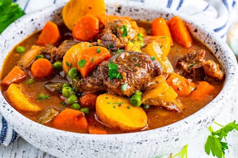 A bowl of beef stew with red wine.