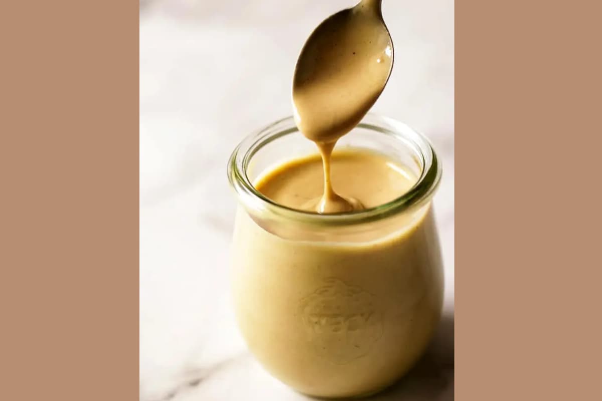 A jar of buddha bowl dressing.