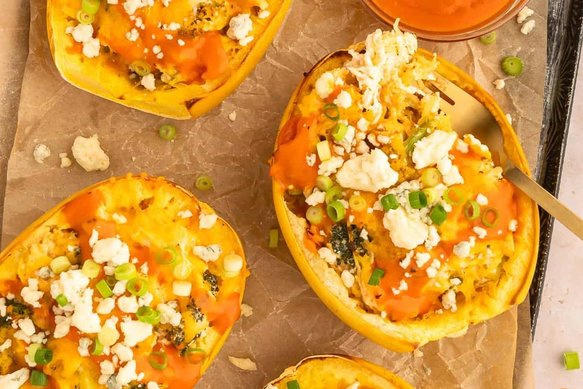 A tray of buffalo chicken spaghetti squash boats.