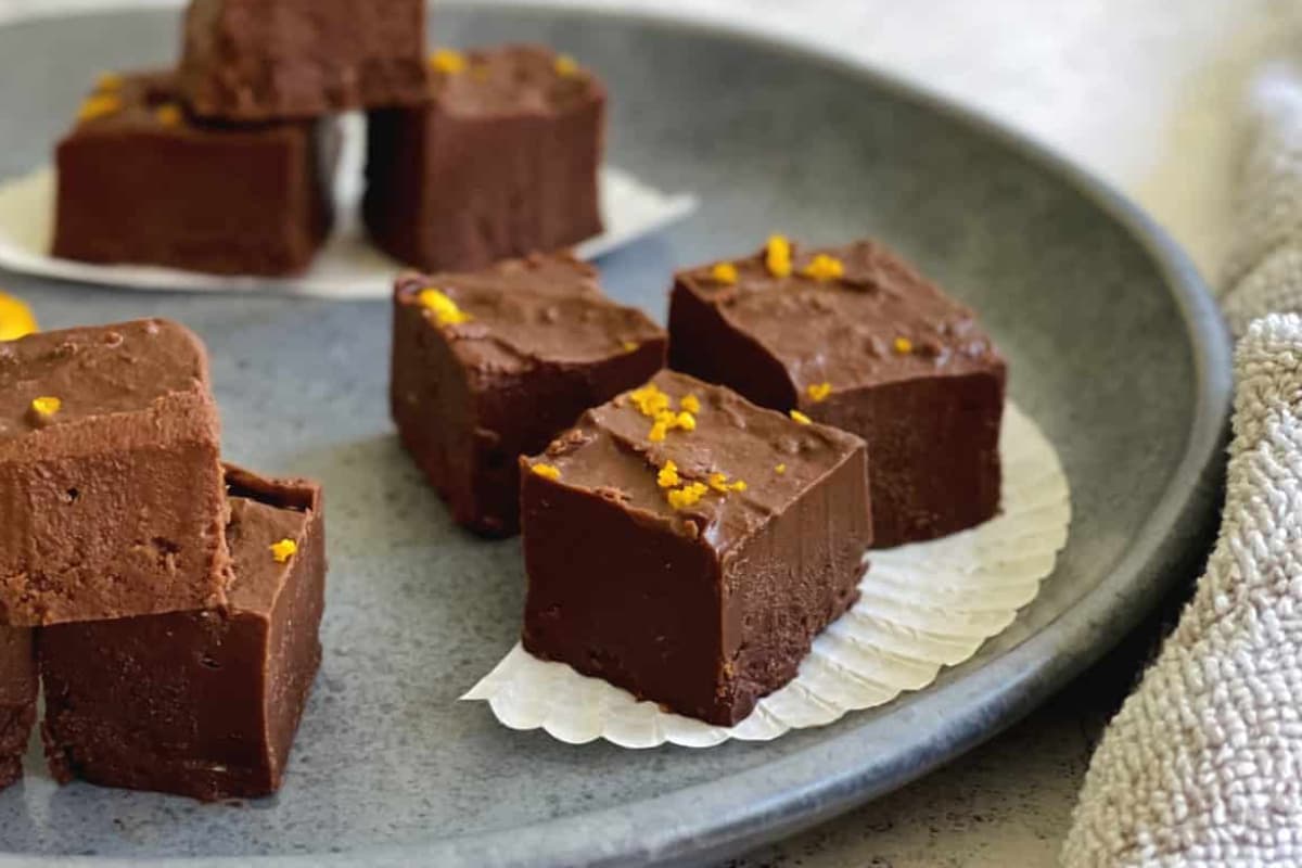 A plate of orange chocolate fudge.