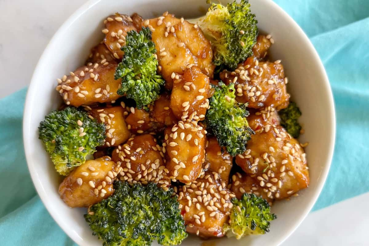 Overhead image of a bowl of general tso's tofu.