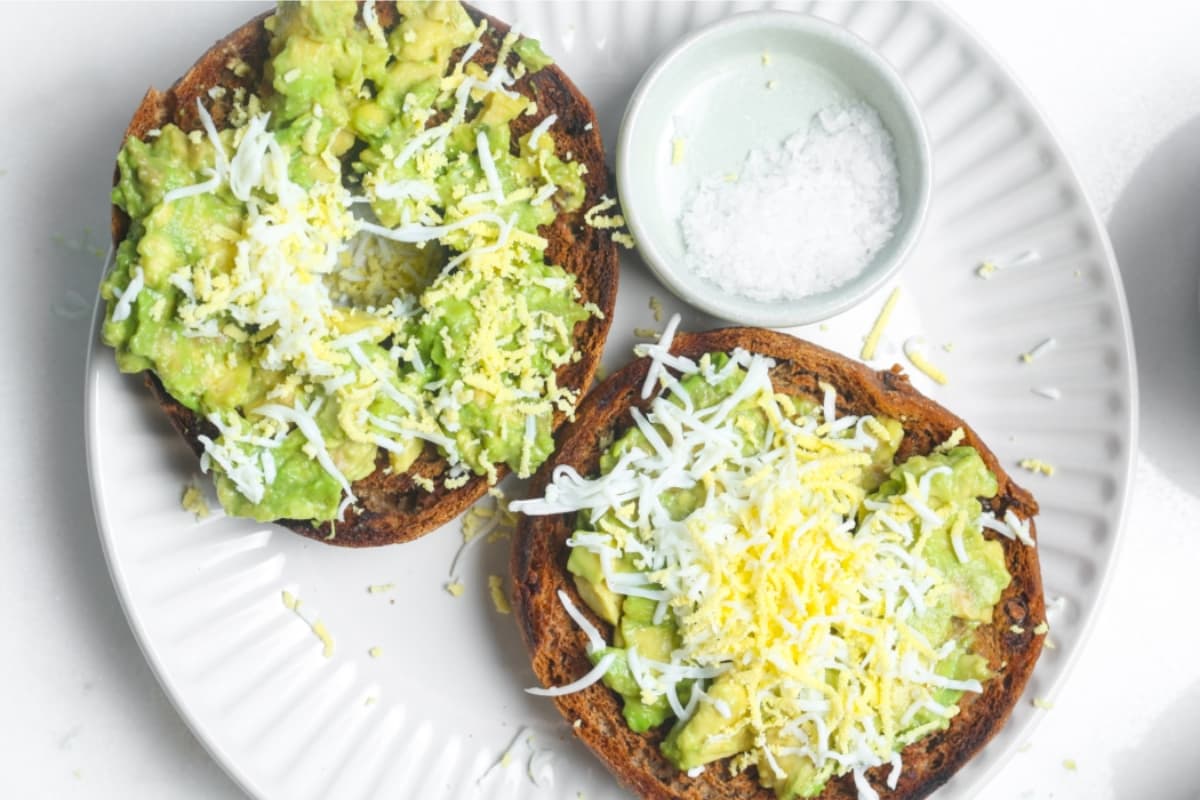 A plate of grated egg avocado toast.