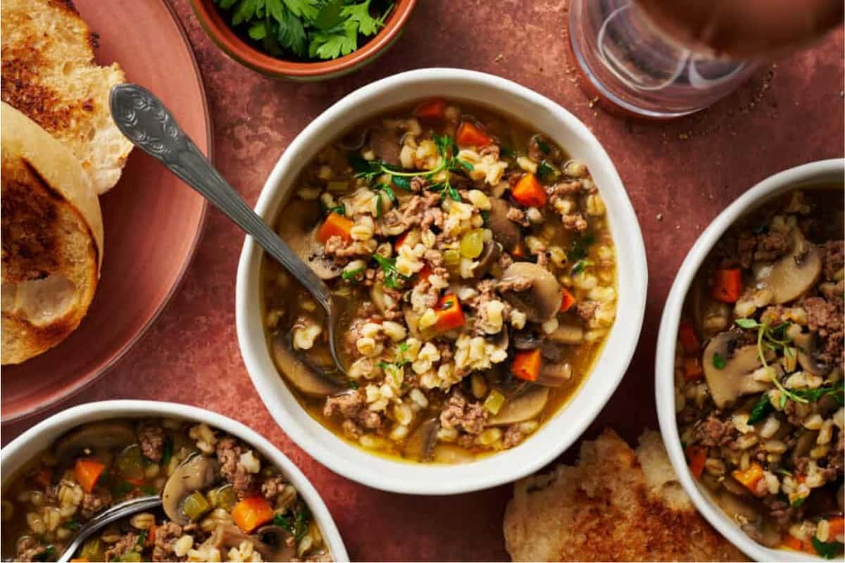 Bowls of beef barley soup.