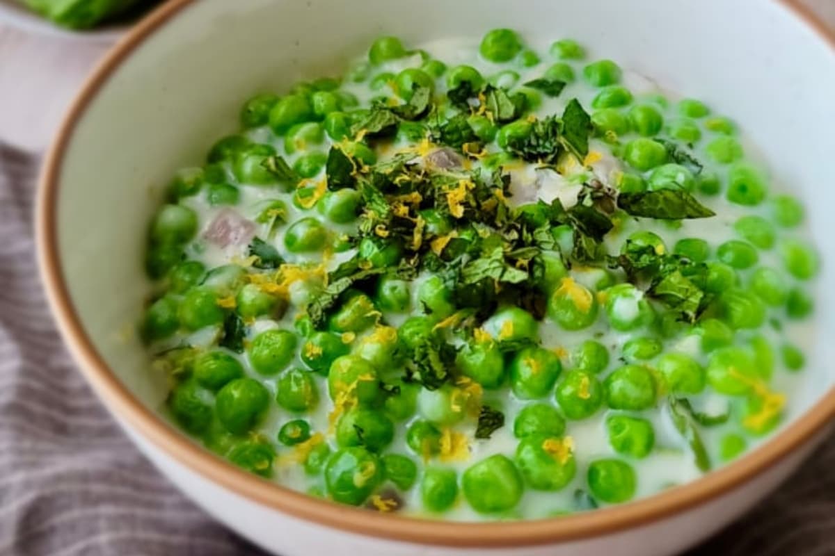 A bowl of minty green peas.