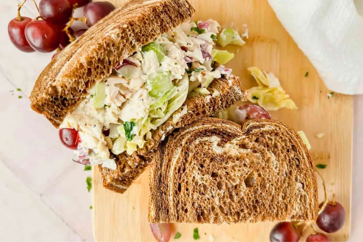 A tray of napa almond chicken salad sandwich.