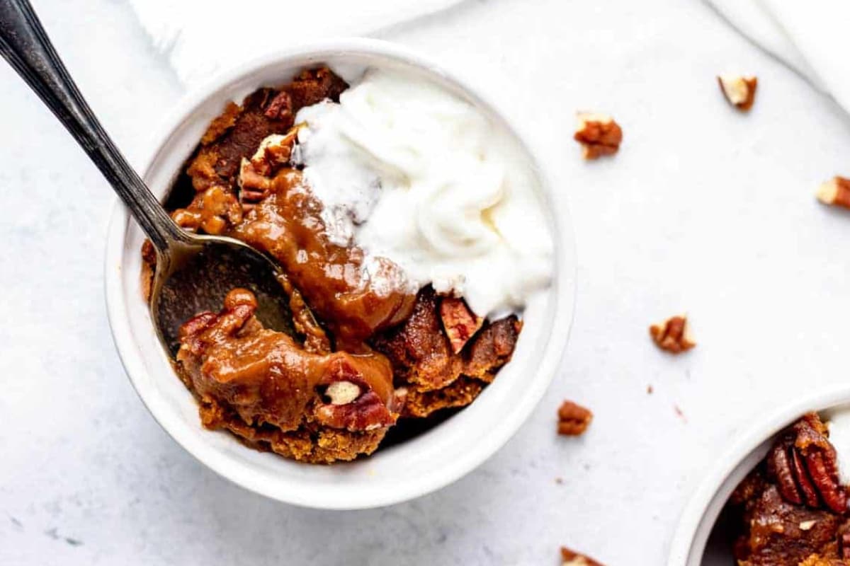 A bowl of pumpkin cake.