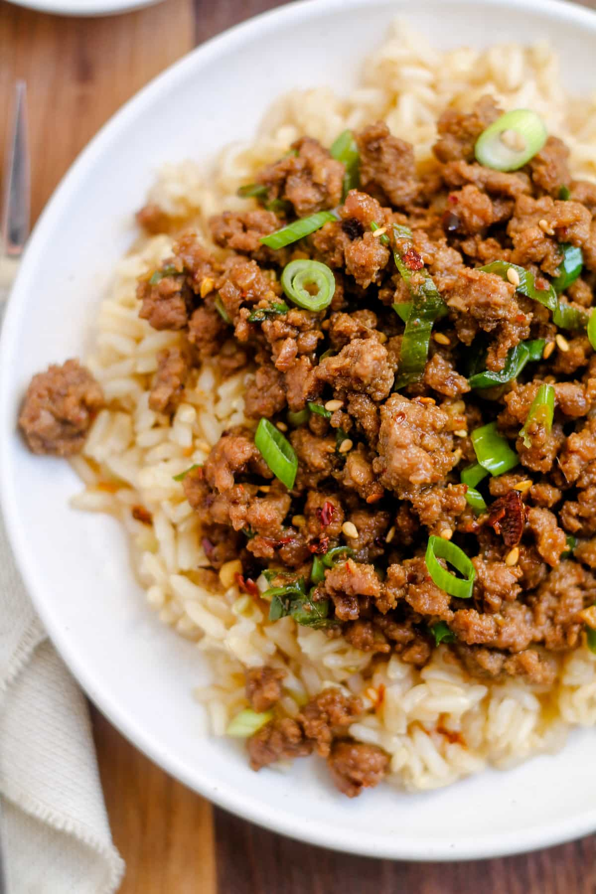 Spicy sesame ground beef bowls on a table.