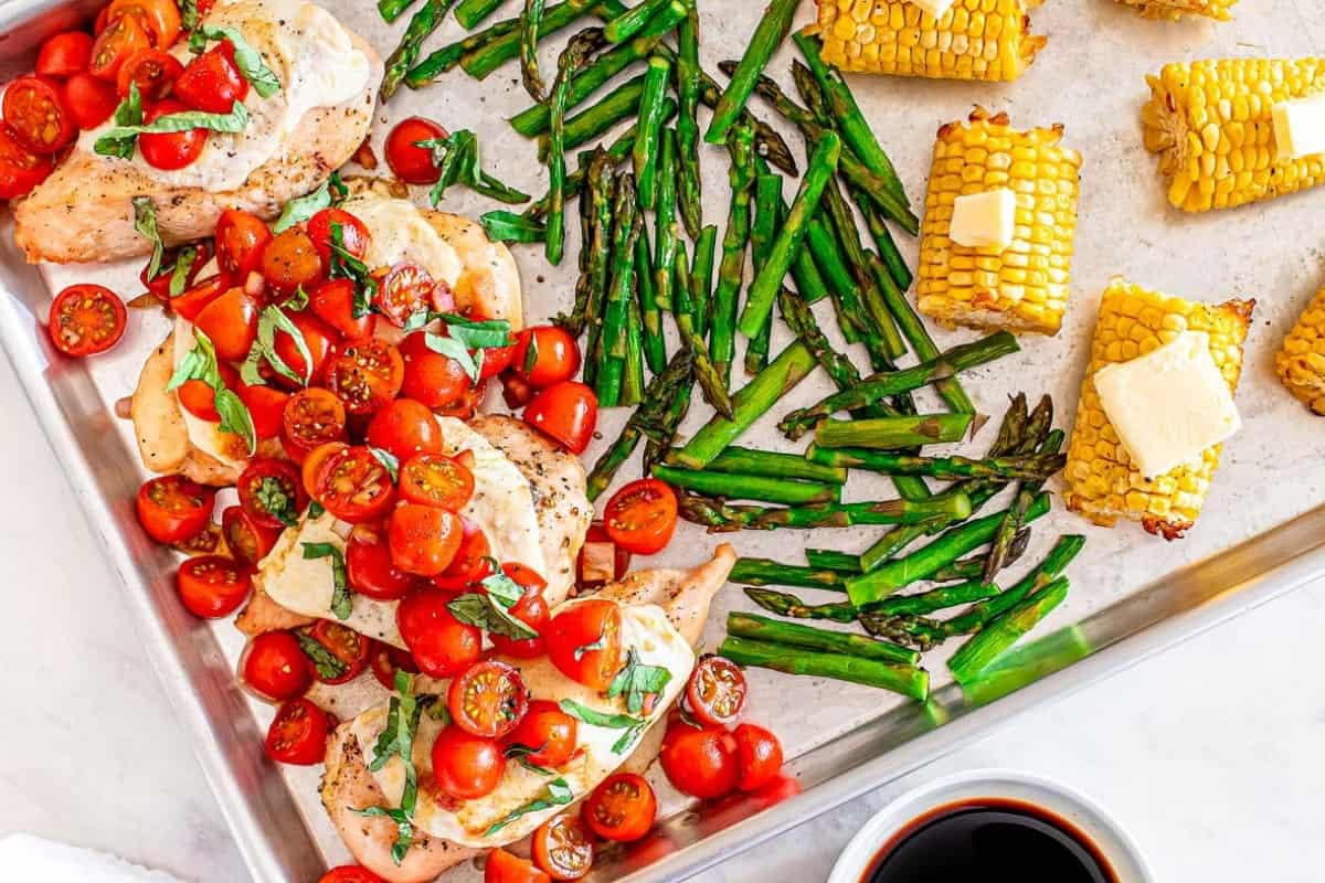 Overhead image of sheet pan chicken caprese.