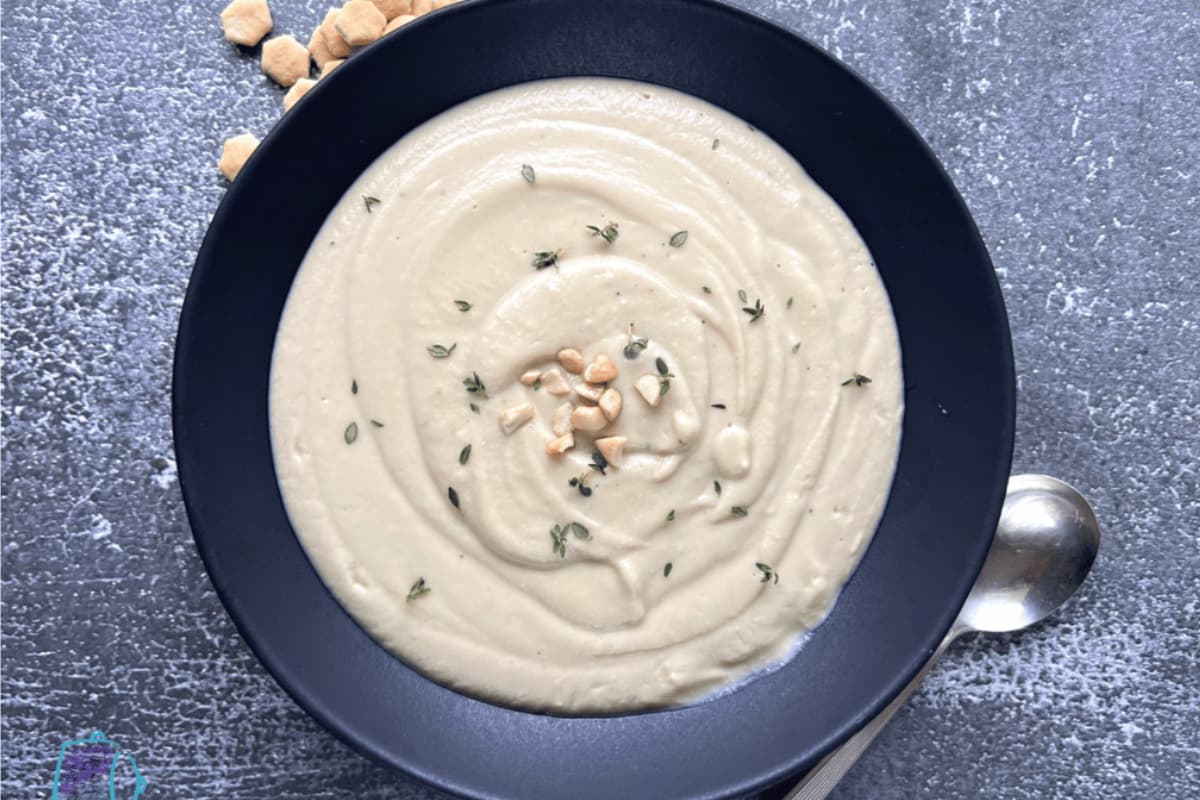 A bowl of slow cooker cauliflower soup.