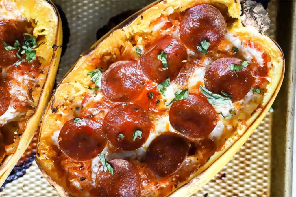 A tray of spaghetti squash pizza boats.