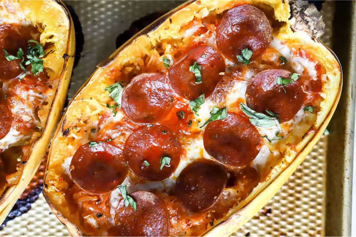 A tray of spaghetti squash pizza boats.