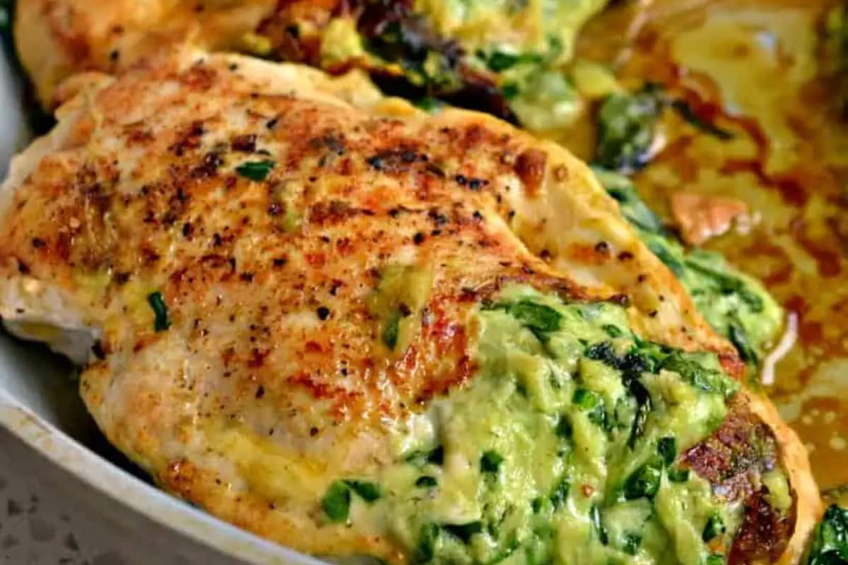 A pan of spinach stuffed chicken.