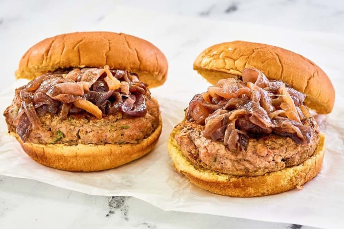 A plate of turkey burgers.