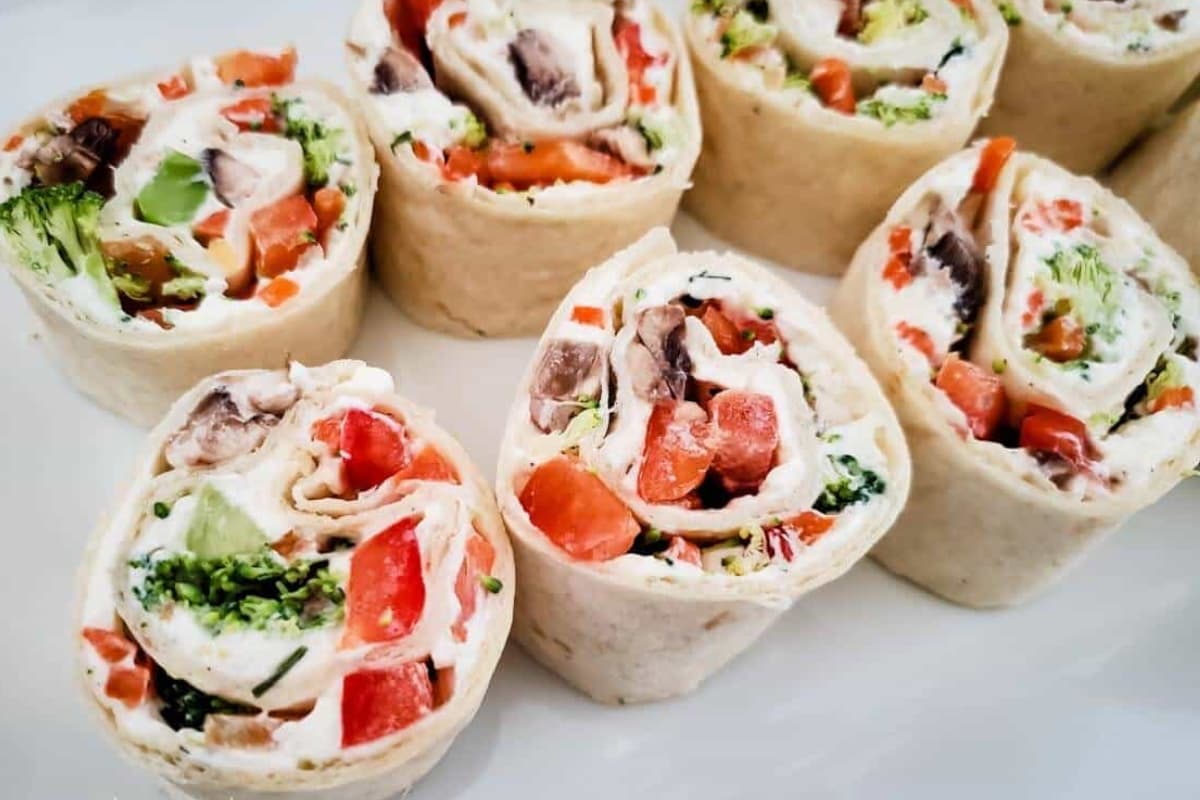 A tray of vegetable pizza pinwheels.