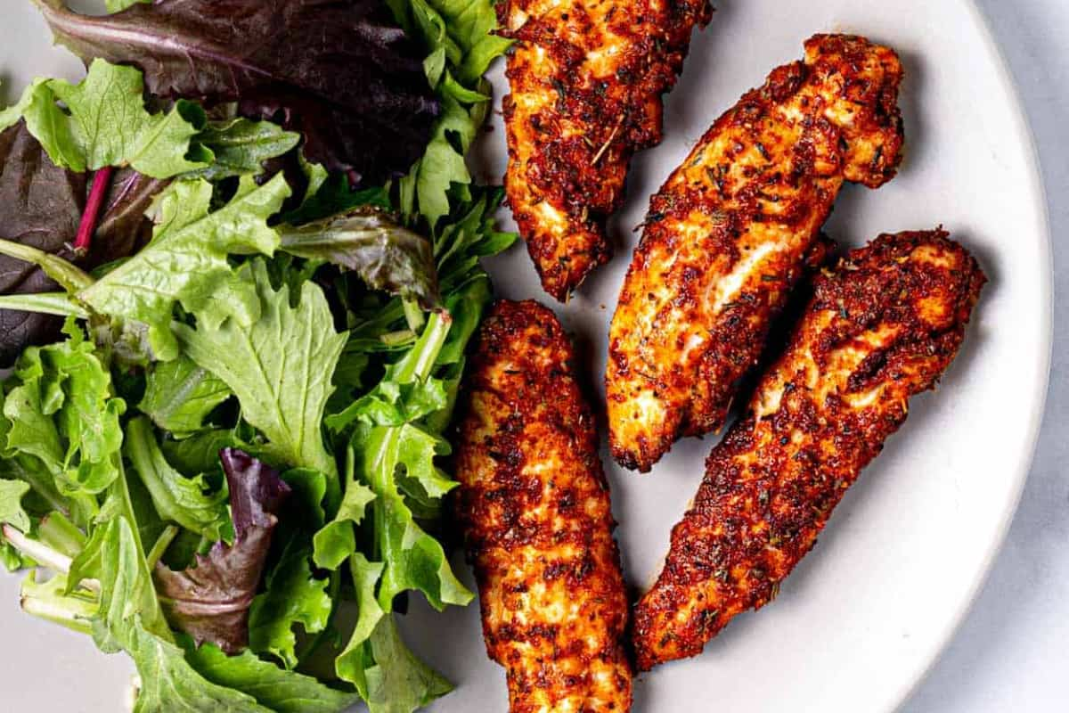 A plate of air fryer chicken tenders.