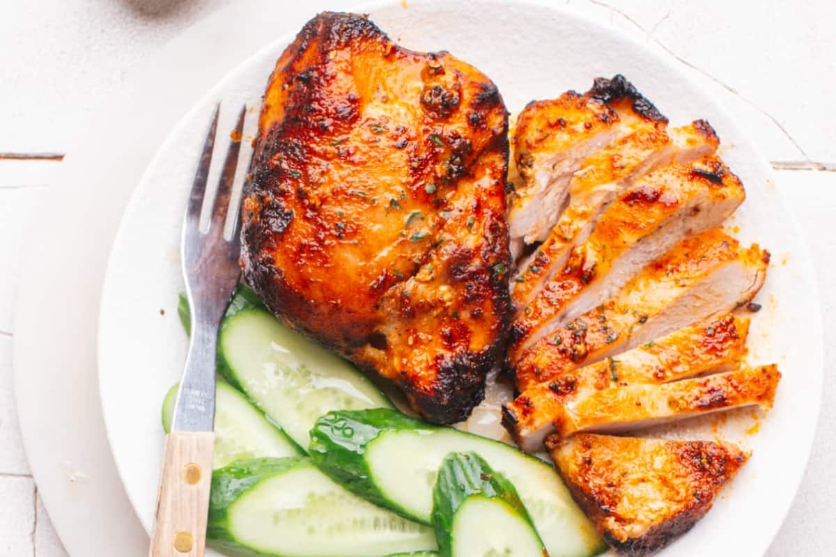 A plate of air fryer frozen chicken breasts.