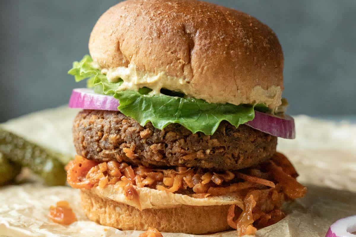 An air fryer veggie burger on a plate.